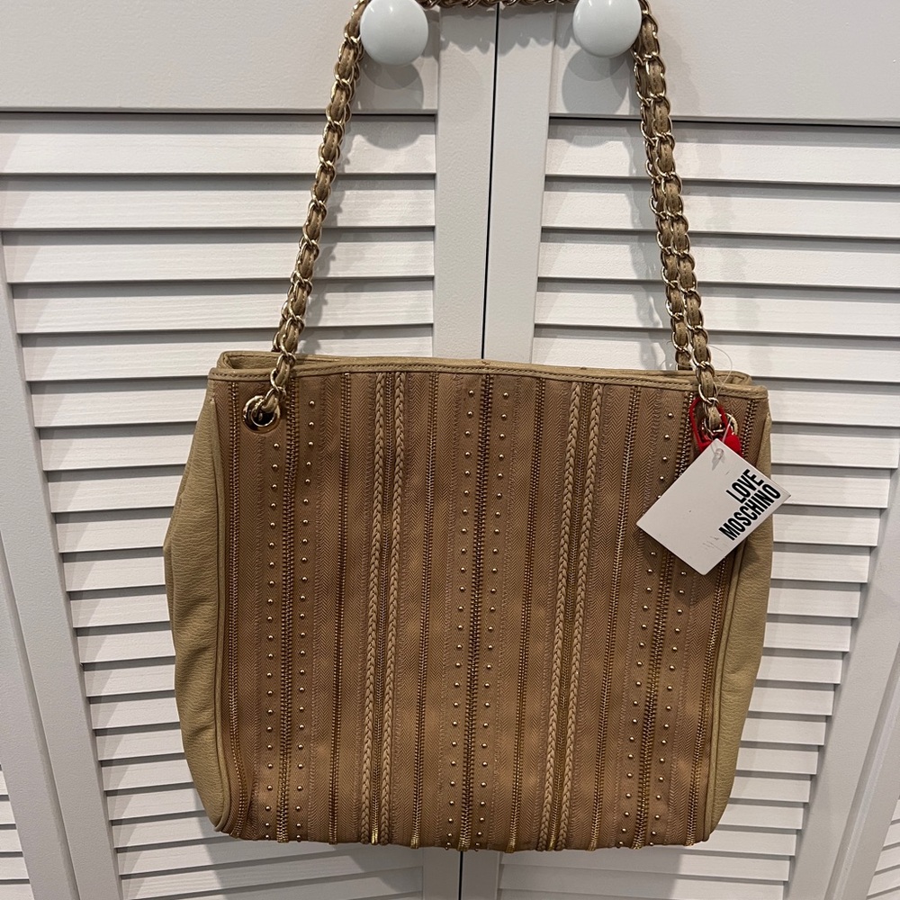 Moschino tote bag with zipper details.
